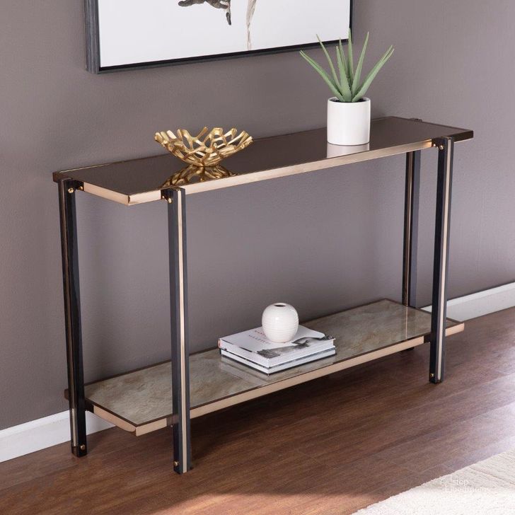The appearance of Thornsett Console Table With Mirrored Top designed by SEI Furniture in the transitional interior design. This champagne piece of furniture  was selected by 1StopBedrooms from Thornsett Collection to add a touch of cosiness and style into your home. Sku: CK1131203. Material: Wood. Product Type: Console Table. Image1