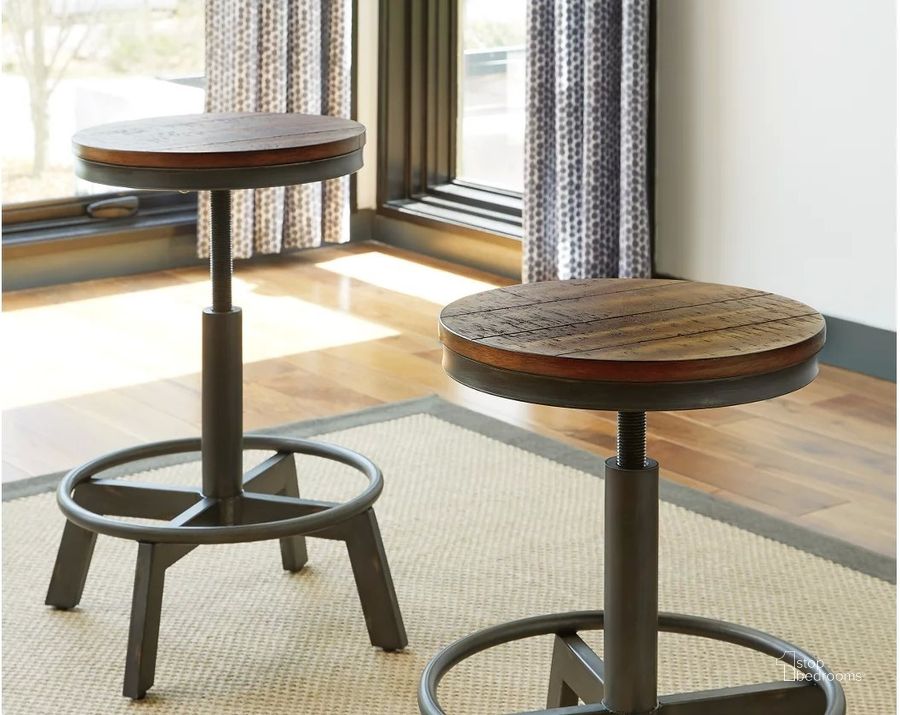 The appearance of Torjin Brown and Gray Stool Set of 2 designed by Signature Design by Ashley in the transitional interior design. This brown and gray piece of furniture  was selected by 1StopBedrooms from Torjin Collection to add a touch of cosiness and style into your home. Sku: D440-024. Material: Metal. Product Type: Barstool. Image1