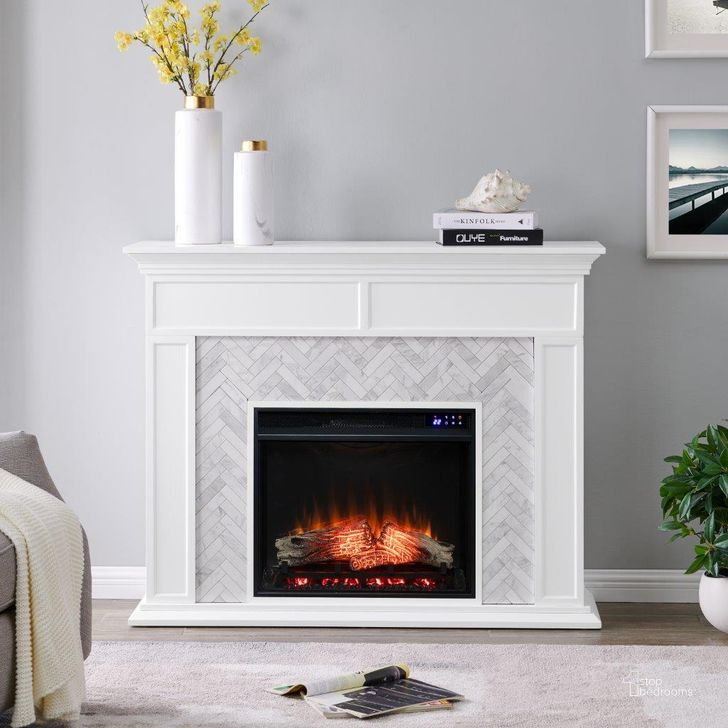 The appearance of Torlington Marble Tiled Touch Screen Electric Fireplace designed by SEI Furniture in the modern / contemporary interior design. This white piece of furniture  was selected by 1StopBedrooms from Torlington Collection to add a touch of cosiness and style into your home. Sku: FR1009359. Material: Wood. Product Type: Fireplace. Image1