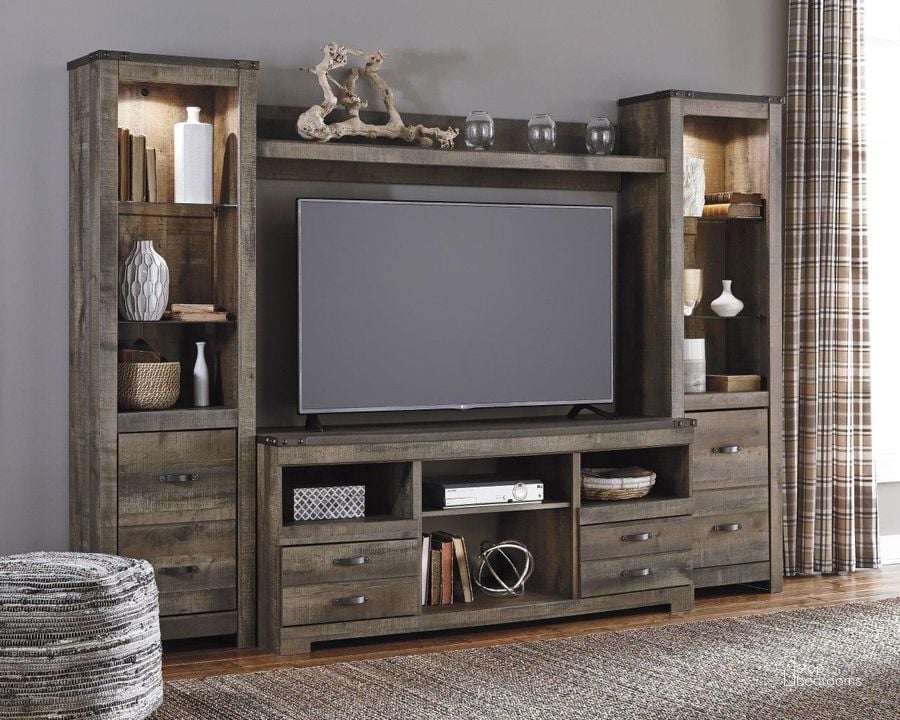 The appearance of Trinell Brown Entertainment Wall designed by Signature Design by Ashley in the transitional interior design. This brown piece of furniture  was selected by 1StopBedrooms from Trinell Collection to add a touch of cosiness and style into your home. Sku: W446-68;W446-24;W446-24;W446-27. Material: Wood. Product Type: Entertainment Wall. Image1