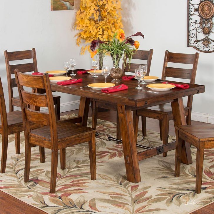 The appearance of Tuscany Vintage Mocha Rectangular Dining Table designed by Sunny Design in the rustic / southwestern interior design. This brown piece of furniture  was selected by 1StopBedrooms from Tuscany Collection to add a touch of cosiness and style into your home. Sku: 1367VM. Table Base Style: Trestle. Material: Wood. Product Type: Dining Table. Table Top Shape: Rectangular. Size: 74". Image1