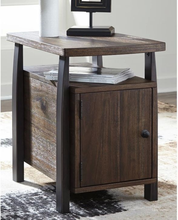 The appearance of Vailbry Brown Chair Side End Table designed by Signature Design by Ashley in the transitional interior design. This brown piece of furniture  was selected by 1StopBedrooms from Vailbry Collection to add a touch of cosiness and style into your home. Sku: T758-7. Material: Wood. Product Type: Chairside Table. Image1