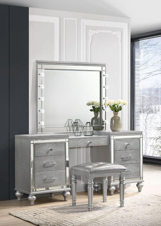 The appearance of Valentino Silver Dressing Table With Stool designed by New Classic in the transitional interior design. This silver piece of furniture  was selected by 1StopBedrooms from Valentino Collection to add a touch of cosiness and style into your home. Sku: BA9698S-090;BA9698S-091;BA9698S-092. Product Type: Bedroom Vanity.