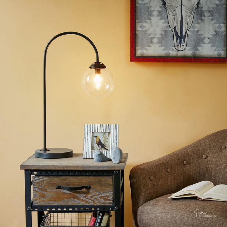 The appearance of Venice Table Lamp In Bronze designed by Olliix in the industrial interior design. This bronze piece of furniture  was selected by 1StopBedrooms from Venice Collection to add a touch of cosiness and style into your home. Sku: II153-0007. Material: Metal. Product Type: Table Lamp. Image1