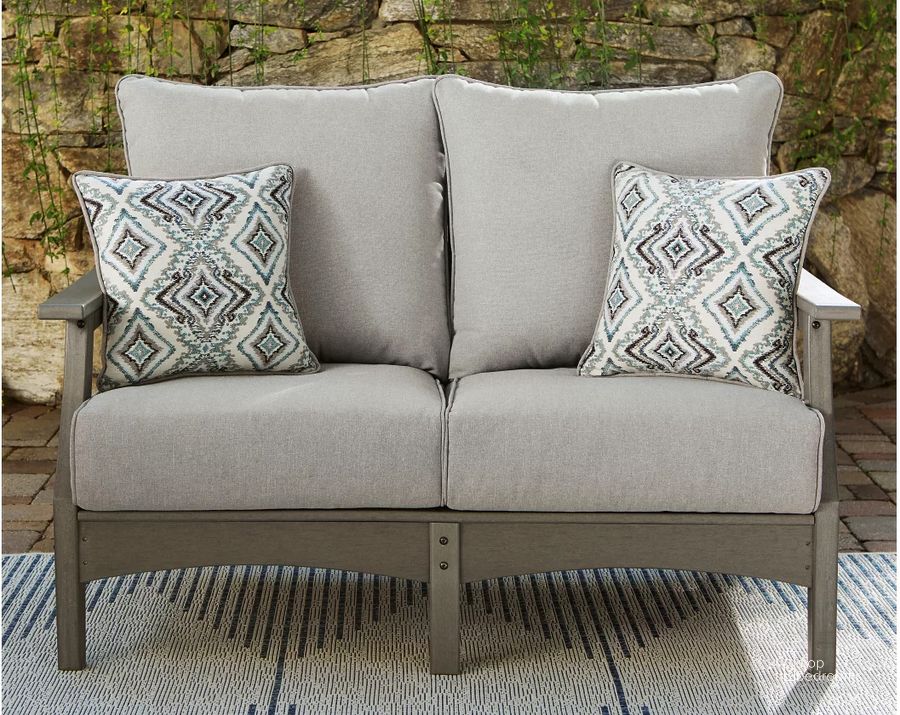 The appearance of Visola Gray Loveseat w/Cushion designed by Signature Design by Ashley in the modern / contemporary interior design. This gray piece of furniture  was selected by 1StopBedrooms from Visola Collection to add a touch of cosiness and style into your home. Sku: P802-835. Material: Fabric. Product Type: Outdoor Loveseat. Image1