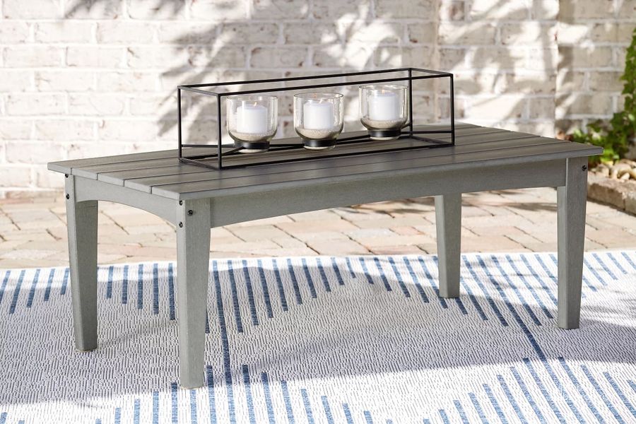 The appearance of Visola Gray Rectangular Cocktail Table designed by Signature Design by Ashley in the modern / contemporary interior design. This gray piece of furniture  was selected by 1StopBedrooms from Visola Collection to add a touch of cosiness and style into your home. Sku: P802-701. Product Type: Outdoor Table. Image1