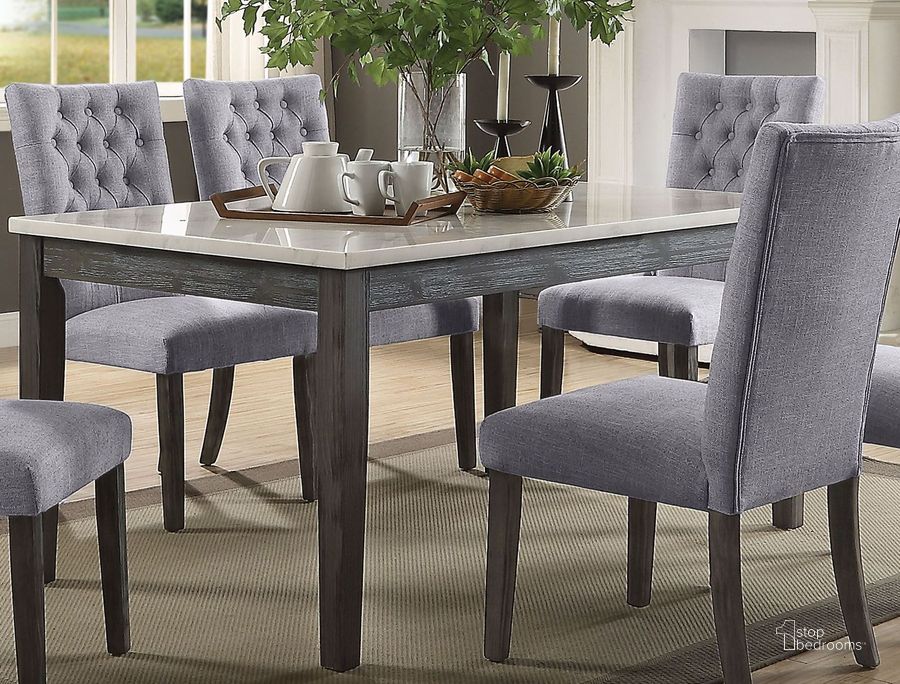 The appearance of Volkner Gray Dining Table designed by Bennett Interiors in the transitional interior design. This gray piece of furniture  was selected by 1StopBedrooms from Volkner Collection to add a touch of cosiness and style into your home. Sku: 70165. Table Base Style: Legs. Material: Wood. Product Type: Dining Table. Table Top Shape: Rectangular. Size: 41". Image1