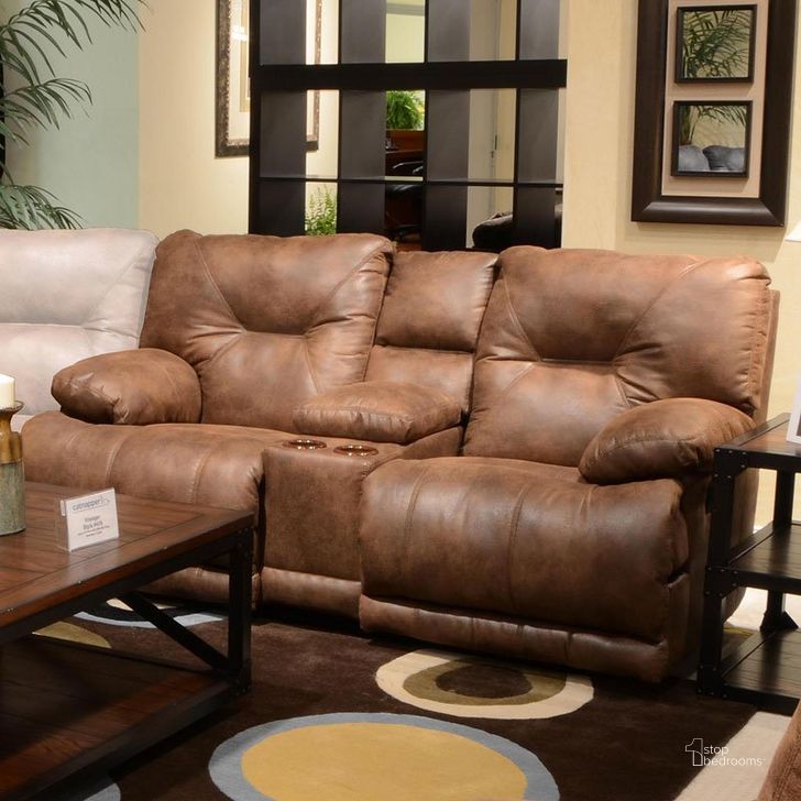 The appearance of Voyager Elk Reclining Loveseat with Console designed by Catnapper in the transitional interior design. This brown piece of furniture  was selected by 1StopBedrooms from Voyager Collection to add a touch of cosiness and style into your home. Sku: 4389122829302829. Material: Polyester. Product Type: Reclining Loveseat.