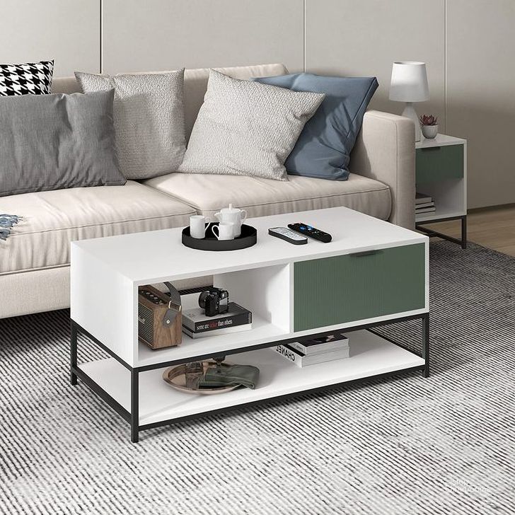 The appearance of Watson White And Green Wood Coffee Table designed by Lilola Home in the modern / contemporary interior design. This white and green piece of furniture  was selected by 1StopBedrooms from Watson Collection to add a touch of cosiness and style into your home. Sku: 52972. Material: Wood. Product Type: Coffee Table. Image1