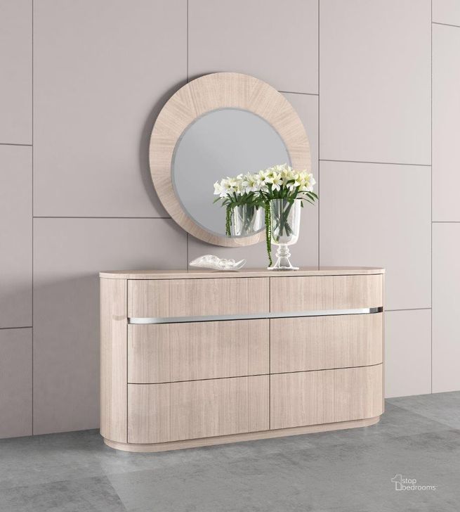 The appearance of Waves Dresser In High Gloss Beige Angley With 6 Self-Closing Drawers designed by Whiteline Modern Living in the modern / contemporary interior design. This beige piece of furniture  was selected by 1StopBedrooms from Waves Collection to add a touch of cosiness and style into your home. Sku: DR1753-BEI. Product Type: Dresser. Image1