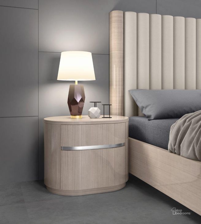 The appearance of Waves Night Stand In High Gloss Beige designed by Whiteline Modern Living in the modern / contemporary interior design. This beige piece of furniture  was selected by 1StopBedrooms from Waves Collection to add a touch of cosiness and style into your home. Sku: NS1753-BEI. Product Type: Nightstand. Image1