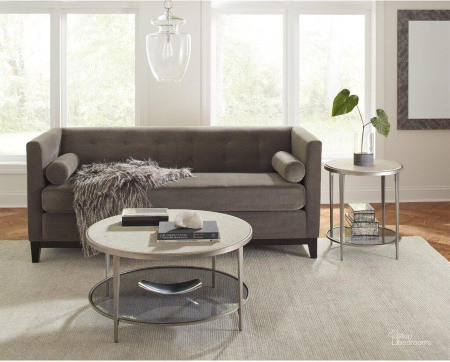 The appearance of Wilshire White Sands Round Cocktail Table designed by Riverside Furniture in the transitional interior design. This brown piece of furniture  was selected by 1StopBedrooms from Wilshire Collection to add a touch of cosiness and style into your home. Sku: 60501. Product Type: Cocktail Table. Image1