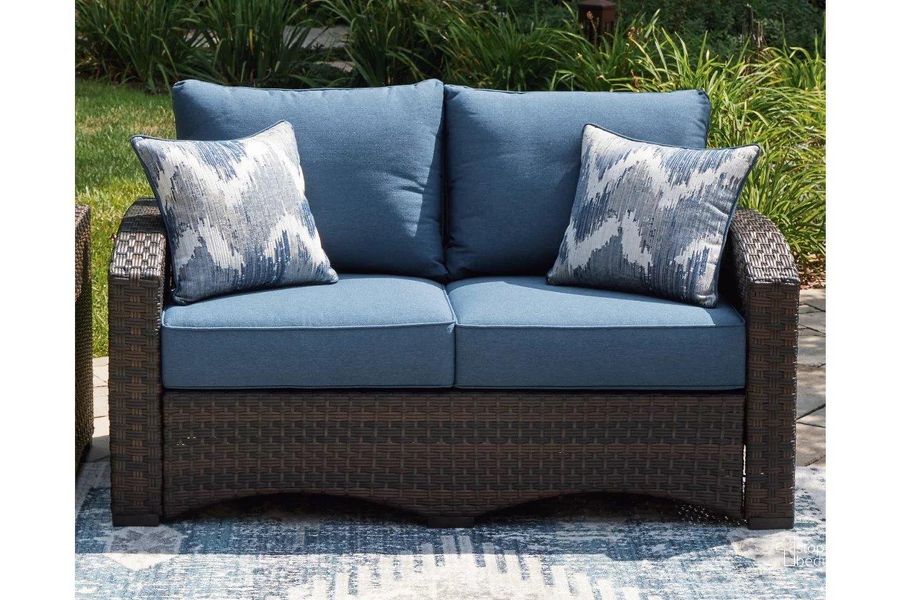 The appearance of Windglow Outdoor Loveseat with Cushion In Blue/Brown designed by Signature Design by Ashley in the transitional interior design. This blue/brown piece of furniture  was selected by 1StopBedrooms from Windglow Collection to add a touch of cosiness and style into your home. Sku: P340-835. Material: Aluminum. Product Type: Outdoor Loveseat. Image1
