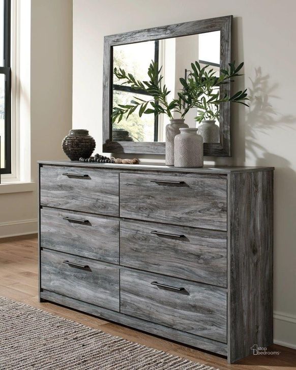 The appearance of Wirihana Gray Dresser and Mirror designed by Bennett Interiors in the transitional interior design. This gray piece of furniture  was selected by 1StopBedrooms from Wirihana Collection to add a touch of cosiness and style into your home. Sku: B221-31;B221-35. Material: Wood. Product Type: Dresser and Mirror. Image1