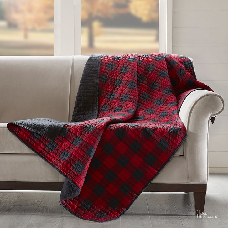 The appearance of Woolrich Check Cotton Thread Count Printed Quilted Throw In Red designed by Olliix in the cabin / lodge interior design. This red piece of furniture  was selected by 1StopBedrooms from Woolrich Check Collection to add a touch of cosiness and style into your home. Sku: WR50-1780. Material: Cotton. Product Type: Throw. Image1