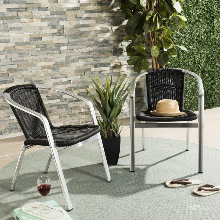 The appearance of Wrangell Black Indoor/Outdoor Stacking Armchair designed by Safavieh in the modern / contemporary interior design. This black piece of furniture  was selected by 1StopBedrooms from Wrangell Collection to add a touch of cosiness and style into your home. Sku: FOX5207E-SET2. Material: Aluminum. Product Type: Arm Chair. Image1