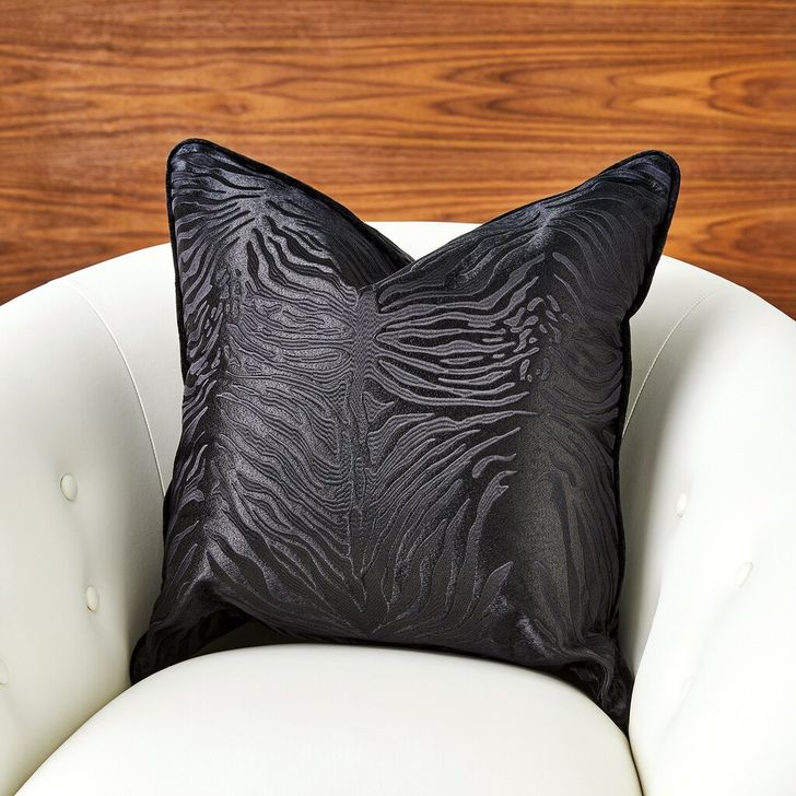 The appearance of Zebra Pillow In Black designed by Global Views in the modern / contemporary interior design. This black piece of furniture  was selected by 1StopBedrooms from Zebra Collection to add a touch of cosiness and style into your home. Sku: 9.93818. Material: Fabric. Product Type: Pillow. Image1