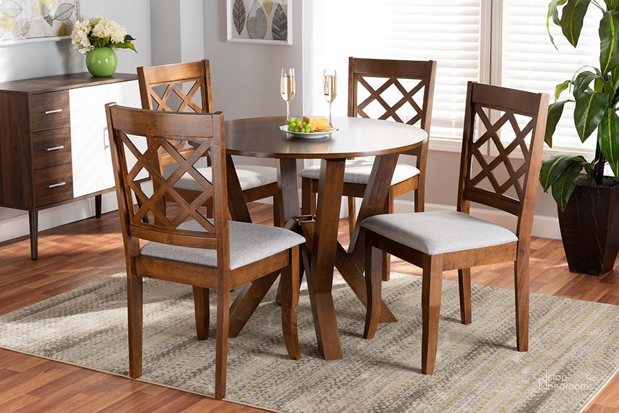 The appearance of Zoe Modern and Contemporary Grey Fabric Upholstered and Walnut Brown Finished Wood 5-Piece Dining Set designed by Baxton Studio in the modern / contemporary interior design. This walnut piece of furniture  was selected by 1StopBedrooms from Zoe Collection to add a touch of cosiness and style into your home. Sku: Zoe-Grey/Walnut-5PC Dining Set. Product Type: Dining Room Set. Material: Rubberwood. Image1