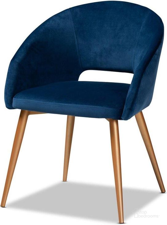 The appearance of Vianne Glam and Luxe Navy Blue Velvet Fabric Upholstered Gold Finished Metal Dining Chair designed by Baxton Studio in the transitional interior design. This gold piece of furniture  was selected by 1StopBedrooms from Vianne Collection to add a touch of cosiness and style into your home. Sku: T-6021-Navy Blue Velvet/Gold-DC. Material: Fabric. Product Type: Dining Chair. Image1