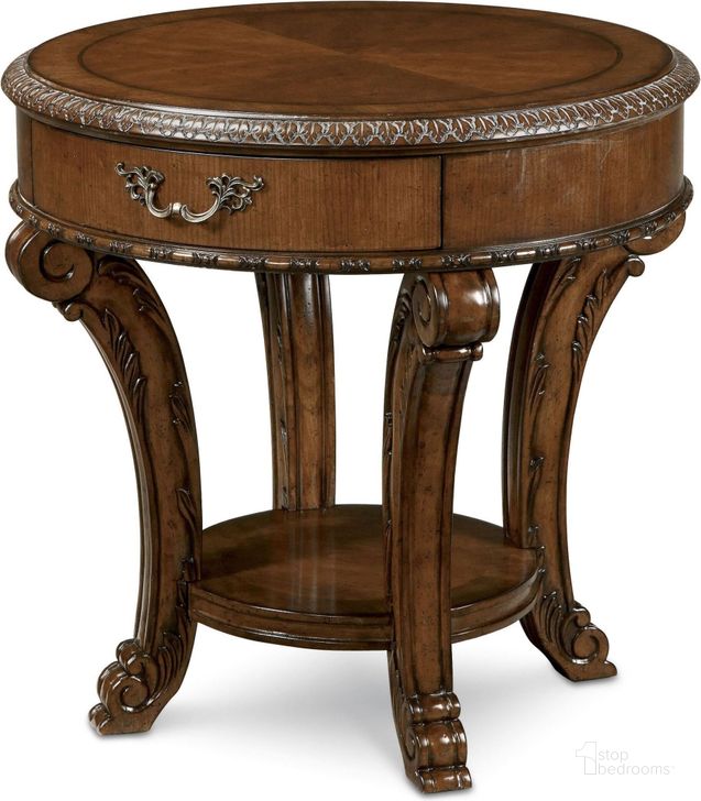 The appearance of Old World Round End Table designed by A.R.T. in the traditional interior design. This brown piece of furniture  was selected by 1StopBedrooms from Old World Collection to add a touch of cosiness and style into your home. Sku: 143303-2606. Table Top Shape: Triangular. Material: Wood. Product Type: End Table. Image1