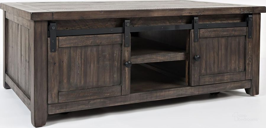 The appearance of Madison County Barnwood Barn Door Cocktail Table designed by Jofran in the traditional interior design. This brown piece of furniture  was selected by 1StopBedrooms from Madison County Collection to add a touch of cosiness and style into your home. Sku: 1700-5. Product Type: Cocktail Table. Material: Pine. Image1