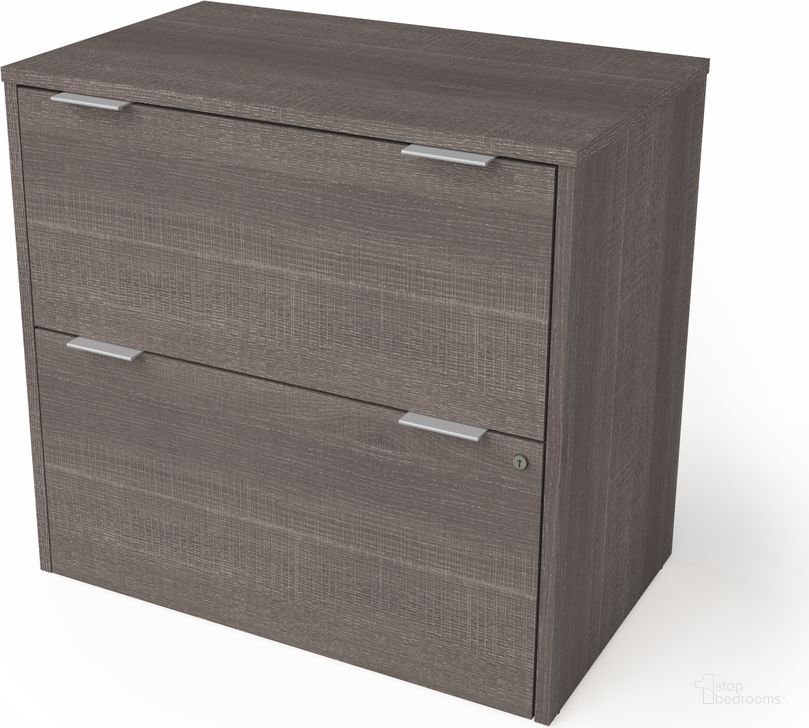 The appearance of I3 Plus Lateral File In Bark Gray designed by Bestar in the modern / contemporary interior design. This bark gray piece of furniture  was selected by 1StopBedrooms from I3 Plus Collection to add a touch of cosiness and style into your home. Sku: 160630-1147. Material: Wood. Product Type: Lateral Filing Cabinet. Image1