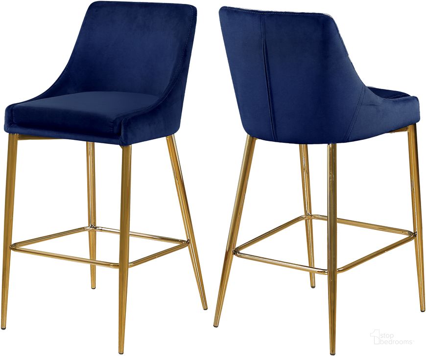 The appearance of Meridian Karina 789Navy Velvet Stool Set of 2 designed by Meridian in the modern / contemporary interior design. This navy velvet piece of furniture  was selected by 1StopBedrooms from Karina Collection to add a touch of cosiness and style into your home. Sku: 789Navy-C. Product Type: Barstool. Material: Velvet. Image1