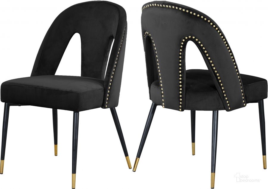 The appearance of Meridian Akoya Black Velvet Dining Chair Set of 2 designed by Meridian in the modern / contemporary interior design. This black velvet piece of furniture  was selected by 1StopBedrooms from Akoya Collection to add a touch of cosiness and style into your home. Sku: 794Black-C. Product Type: Dining Chair. Material: Velvet. Image1