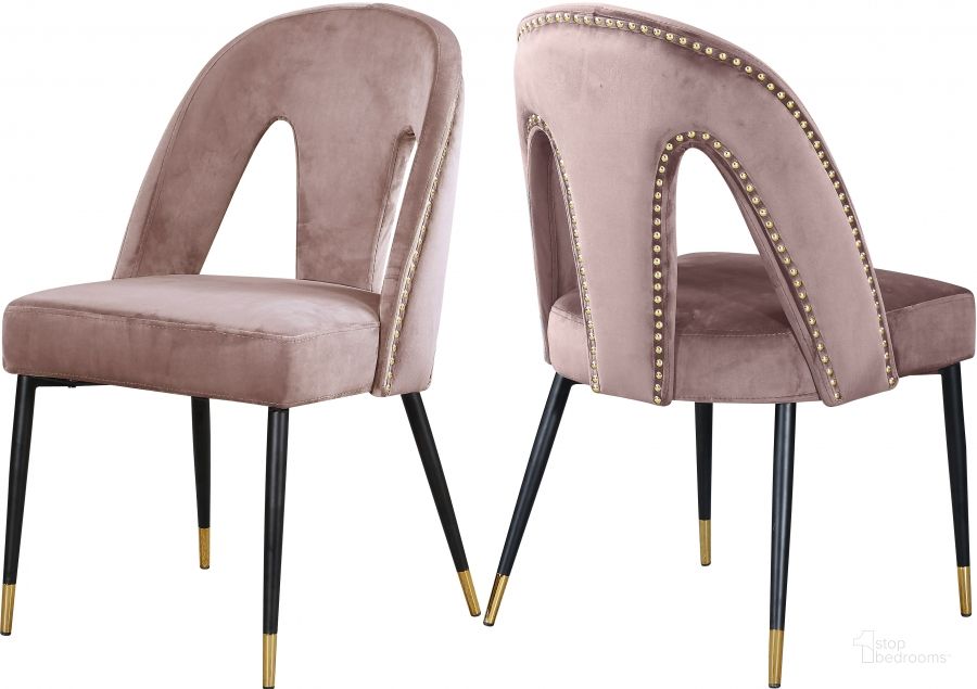 The appearance of Meridian Akoya Pink Velvet Dining Chair Set of 2 designed by Meridian in the modern / contemporary interior design. This pink velvet piece of furniture  was selected by 1StopBedrooms from Akoya Collection to add a touch of cosiness and style into your home. Sku: 794Pink-C. Product Type: Dining Chair. Material: Velvet. Image1