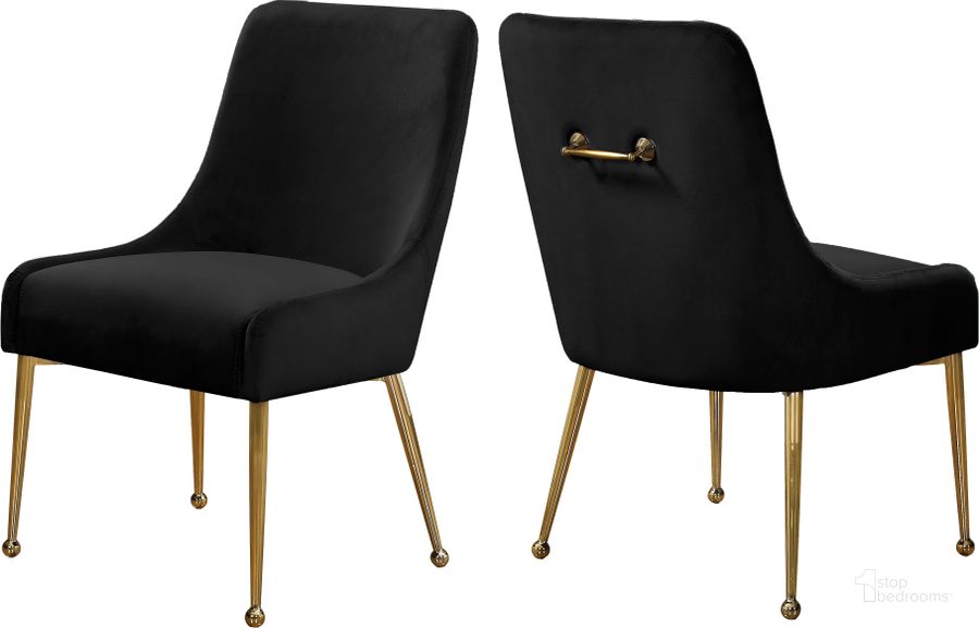 The appearance of Meridian Owen Black Velvet Dining Chair Set of 2 designed by Meridian in the modern / contemporary interior design. This black velvet piece of furniture  was selected by 1StopBedrooms from Owen Collection to add a touch of cosiness and style into your home. Sku: 744Black. Product Type: Dining Chair. Material: Velvet. Image1