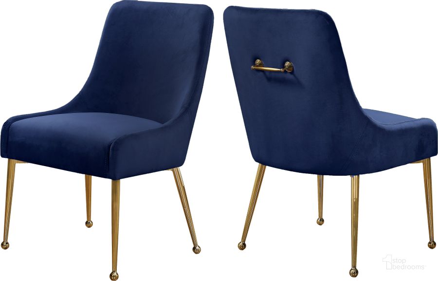 The appearance of Meridian Owen Navy Velvet Dining Chair Set of 2 designed by Meridian in the modern / contemporary interior design. This navy velvet piece of furniture  was selected by 1StopBedrooms from Owen Collection to add a touch of cosiness and style into your home. Sku: 744Navy. Product Type: Dining Chair. Material: Velvet. Image1