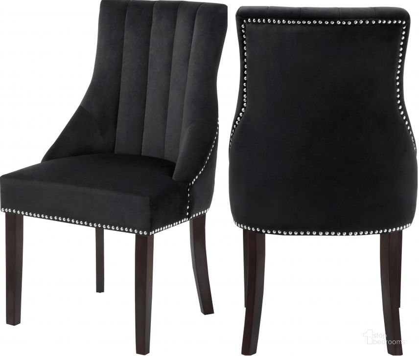 The appearance of Meridian Oxford Black Velvet Dining Chair Set of 2 designed by Meridian in the modern / contemporary interior design. This black velvet piece of furniture  was selected by 1StopBedrooms from Oxford Collection to add a touch of cosiness and style into your home. Sku: 721Black-C. Product Type: Dining Chair. Material: Velvet. Image1