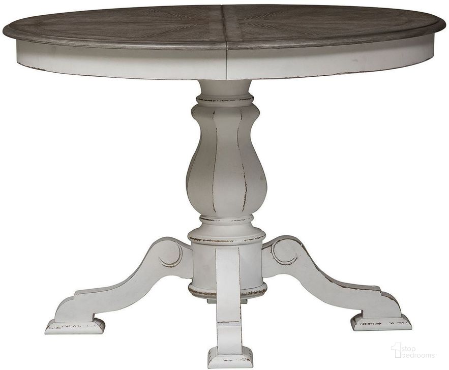 The appearance of Magnolia Manor Antique White Extendable Dining Table designed by Liberty in the transitional interior design. This antique white piece of furniture  was selected by 1StopBedrooms from Magnolia Manor Collection to add a touch of cosiness and style into your home. Sku: 244-T4260;244-P4260. Table Base Style: Pedestal. Table Top Shape: Round. Material: Wood. Product Type: Dining Table. Image1