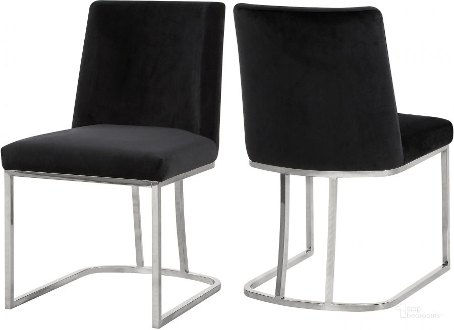 The appearance of Meridian Heidi Black Velvet Dining Chair (Set of 2) designed by Meridian in the modern / contemporary interior design. This black piece of furniture  was selected by 1StopBedrooms from Heidi Collection to add a touch of cosiness and style into your home. Sku: 728Black-C. Product Type: Dining Chair. Material: Velvet. Image1