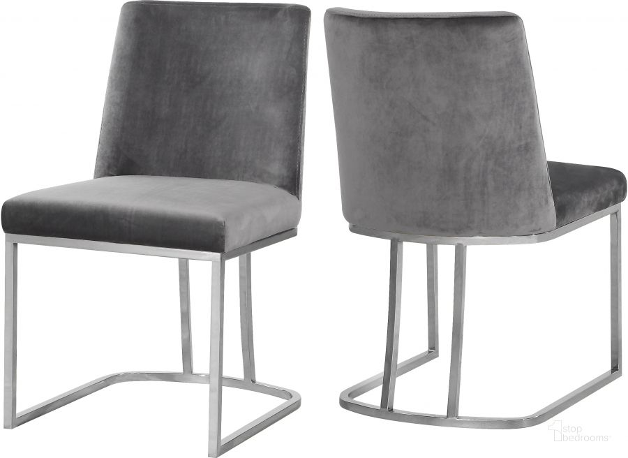 The appearance of Meridian Heidi Grey Velvet Dining Chair (Set of 2) designed by Meridian in the modern / contemporary interior design. This grey velvet piece of furniture  was selected by 1StopBedrooms from Heidi Collection to add a touch of cosiness and style into your home. Sku: 728Grey-C. Product Type: Dining Chair. Material: Velvet. Image1