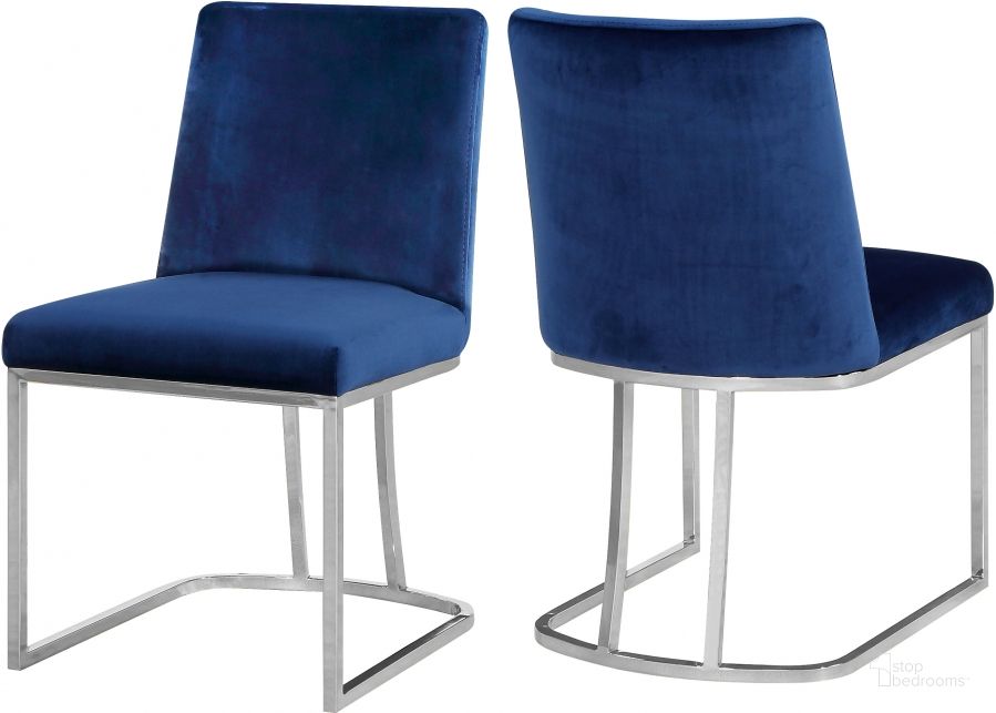The appearance of Meridian Heidi Navy Velvet Dining Chair (Set of 2) designed by Meridian in the modern / contemporary interior design. This navy velvet piece of furniture  was selected by 1StopBedrooms from Heidi Collection to add a touch of cosiness and style into your home. Sku: 728Navy-C. Product Type: Dining Chair. Material: Velvet. Image1