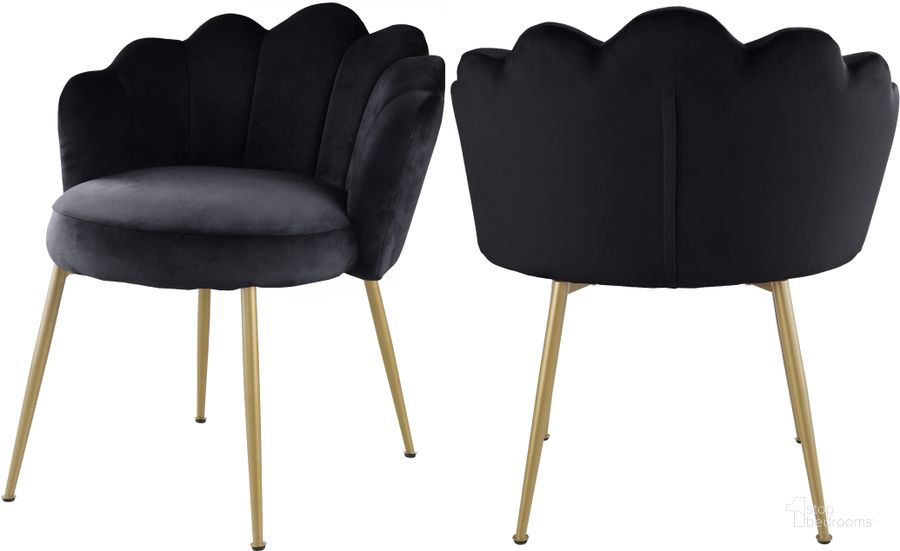 The appearance of Claire Black Velvet Dining Chair (Set of 2) designed by Meridian in the modern / contemporary interior design. This black velvet piece of furniture  was selected by 1StopBedrooms from Claire Collection to add a touch of cosiness and style into your home. Sku: 748Black-C. Product Type: Dining Chair. Material: Velvet. Image1