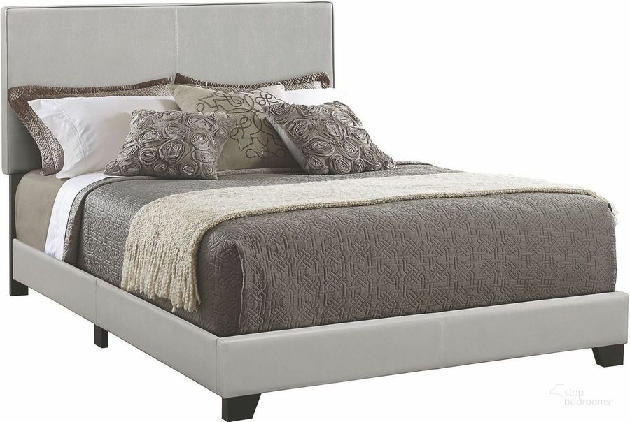The appearance of Dorian Grey King Upholstered Platform Bed designed by Coaster in the transitional interior design. This gray piece of furniture  was selected by 1StopBedrooms from Dorian Collection to add a touch of cosiness and style into your home. Sku: 300763KE. Bed Type: Platform Bed. Product Type: Platform Bed. Bed Size: King. Material: Vinyl. Image1
