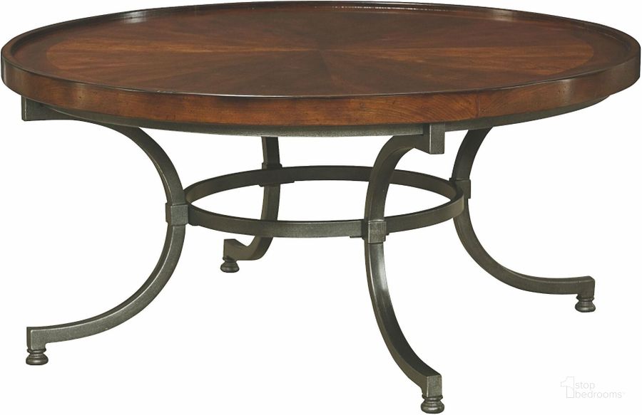 The appearance of Barrow Rich Amber Round Cocktail Table designed by Hammary in the transitional interior design. This brown piece of furniture  was selected by 1StopBedrooms from Barrow Collection to add a touch of cosiness and style into your home. Sku: 358-911. Table Top Shape: Round. Material: Metal. Product Type: Cocktail Table. Image1
