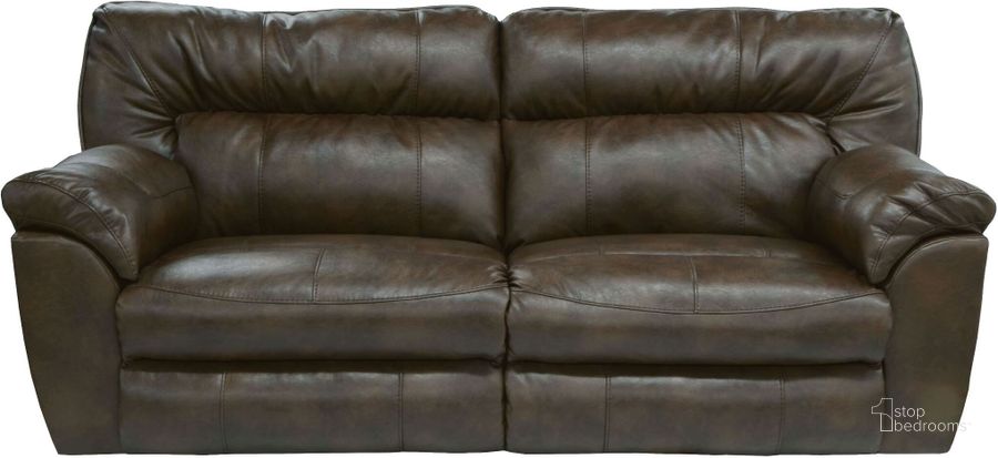 The appearance of Nolan Godiva Reclining Sofa designed by Catnapper in the transitional interior design. This brown piece of furniture  was selected by 1StopBedrooms from Nolan Collection to add a touch of cosiness and style into your home. Sku: 4041122329302329. Material: Bonded Leather. Product Type: Reclining Sofa. Image1