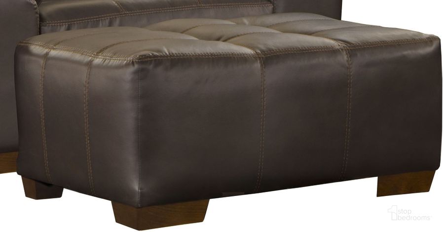 The appearance of Hudson Chocolate Ottoman designed by Jackson in the modern / contemporary interior design. This brown piece of furniture  was selected by 1StopBedrooms from Hudson Collection to add a touch of cosiness and style into your home. Sku: 4396101152912529. Product Type: Ottoman. Material: Vinyl. Image1