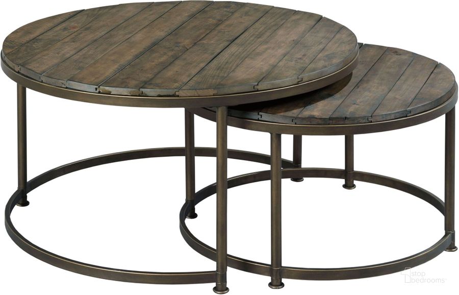 The appearance of Leone Weathered Barn Round Cocktail Table designed by Hammary in the traditional interior design. This brown piece of furniture  was selected by 1StopBedrooms from Leone Collection to add a touch of cosiness and style into your home. Sku: 563-911. Table Top Shape: Round. Material: Metal. Product Type: Cocktail Table. Image1