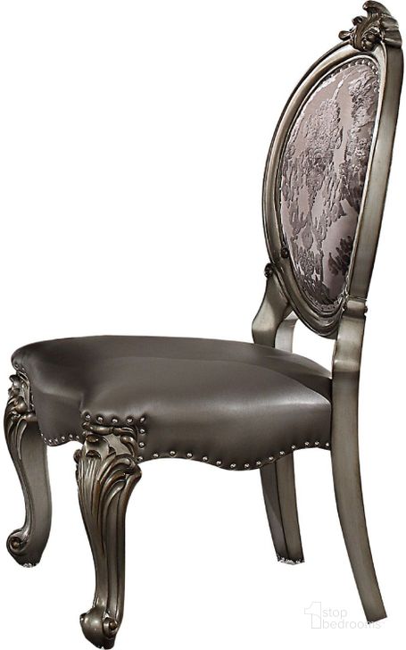 The appearance of Versailles Silver Antique Platinum Side Chair Set of 2 designed by ACME in the rustic / southwestern interior design. This silver piece of furniture  was selected by 1StopBedrooms from Versailles Collection to add a touch of cosiness and style into your home. Sku: 66822. Product Type: Side Chair. Material: Vinyl. Image1