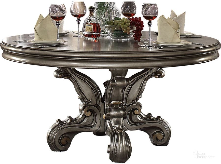 The appearance of Versailles Antique Platinum Round Pedestal Dining Table designed by ACME in the rustic / southwestern interior design. This silver piece of furniture  was selected by 1StopBedrooms from Versailles Collection to add a touch of cosiness and style into your home. Sku: 66840T;66841ST. Table Top Shape: Round. Material: Wood. Product Type: Pedestal Table. Image1
