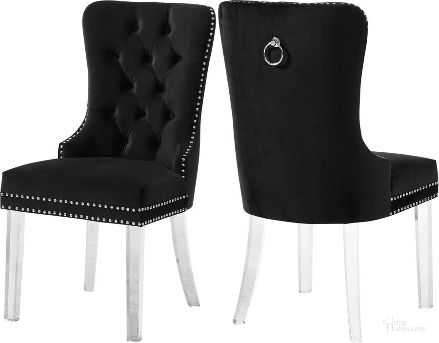 The appearance of Meridian Furniture Miley Velvet Dining Chair in Black Set of 2 designed by Meridian in the modern / contemporary interior design. This black velvet piece of furniture  was selected by 1StopBedrooms from Miley Collection to add a touch of cosiness and style into your home. Sku: 746Black-C. Product Type: Dining Chair. Material: Velvet. Image1