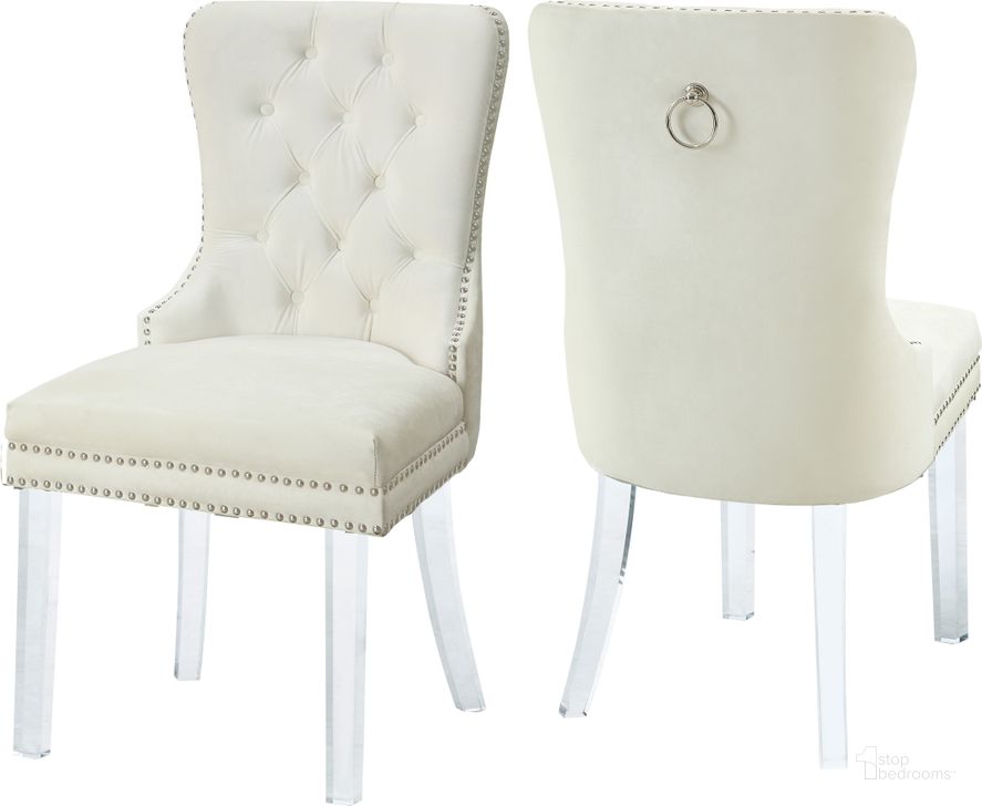 The appearance of Meridian Furniture Miley Velvet Dining Chair in Cream Set of 2 designed by Meridian in the modern / contemporary interior design. This cream velvet piece of furniture  was selected by 1StopBedrooms from Miley Collection to add a touch of cosiness and style into your home. Sku: 746Cream-C. Product Type: Dining Chair. Material: Velvet. Image1