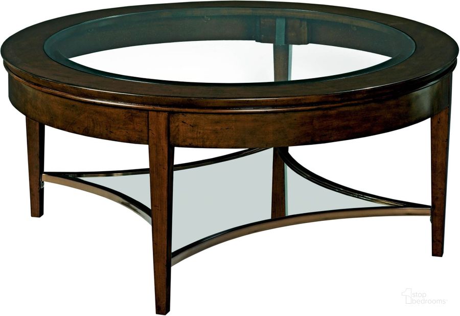 The appearance of Elise Aura Hand-rubbed amaretto Cocktail Table designed by Kincaid in the modern / contemporary interior design. This brown piece of furniture  was selected by 1StopBedrooms from Elise Collection to add a touch of cosiness and style into your home. Sku: 77-024. Table Top Shape: Triangular. Material: Wood. Product Type: Cocktail Table. Image1