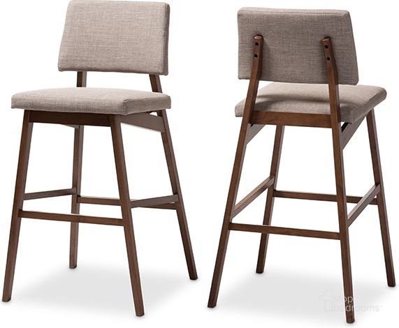 The appearance of Baxton Studio Colton Mid-Century Modern Light Gray Fabric Upholstered And Walnut-Finished Wood Bar Stool Set Of 2 designed by Baxton Studio in the transitional interior design. This light gray piece of furniture  was selected by 1StopBedrooms from Colton Collection to add a touch of cosiness and style into your home. Sku: Colton-Light Grey-BS. Product Type: Barstool. Material: Rubberwood. Image1