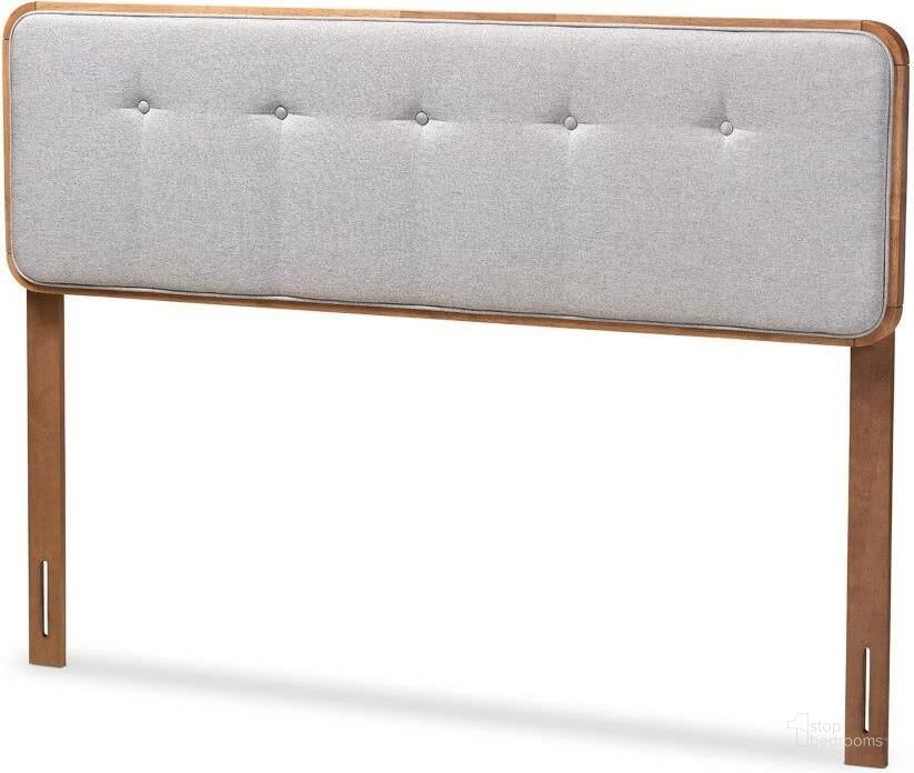 The appearance of Baxton Studio Palina Mid-Century Modern Light Grey Fabric Upholstered Walnut Brown Finished Wood Full Size Headboard designed by Baxton Studio in the transitional interior design. This gray piece of furniture  was selected by 1StopBedrooms from Palina Collection to add a touch of cosiness and style into your home. Sku: MG3000PC-Light Grey/Ash Walnut-HB-Full. Product Type: Headboard. Bed Size: Full. Material: Rubberwood. Image1