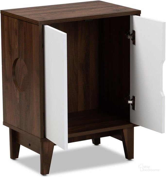 The appearance of Baxton Studio Romy Mid-Century Modern Two-Tone Walnut Brown and White Finished 2-Door Wood Cat Litter Box Cover House designed by Baxton Studio in the transitional interior design. This white piece of furniture  was selected by 1StopBedrooms from Romy Collection to add a touch of cosiness and style into your home. Sku: SECHC150011WI-Columbia/White-Cat House. Material: MDF. Product Type: Miscellaneous. Image1